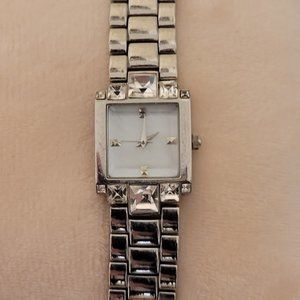 Japan Movement women's blingy stainless steel silver chain watch.